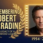 A classic portrait of actor Robert Carradine smiling warmly during his time starring on the Disney Channel series Lizzie McGuire.