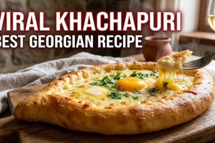 A cross-sectional macro shot of freshly baked Khachapuri, displaying a dense, golden-brown crust and a perfectly emulsified, stretching core of low-moisture cheese.