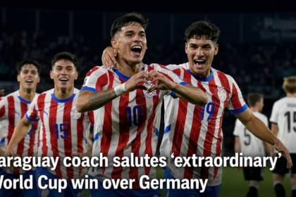 Paraguay's head coach Gustavo Alfaro celebrating after his team's penalty shootout victory against Germany.