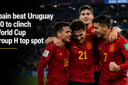 Spain's Alex Baena celebrating with teammates after scoring the winning goal against Uruguay at the 2026 World Cup.
