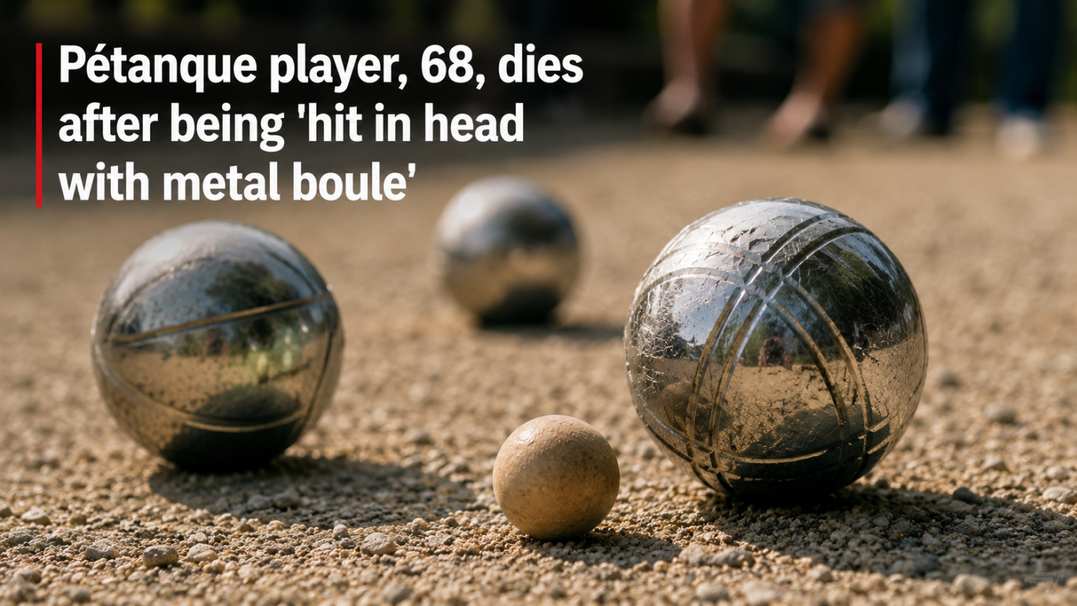 A close-up photograph of several professional hollow steel pétanque boules resting on a coarse gravel court surface under harsh, bright sunlight.